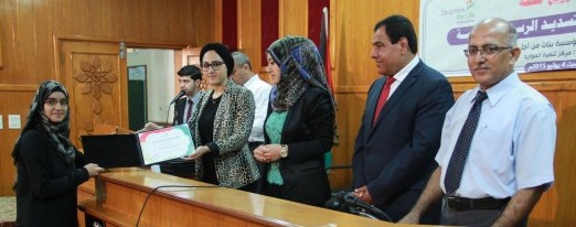 Dr. Abuelaish, Dalal Abuelaish, Shatha Abuelaish and Al IU staff with one of award recipients at Al Islamic University Ceremony